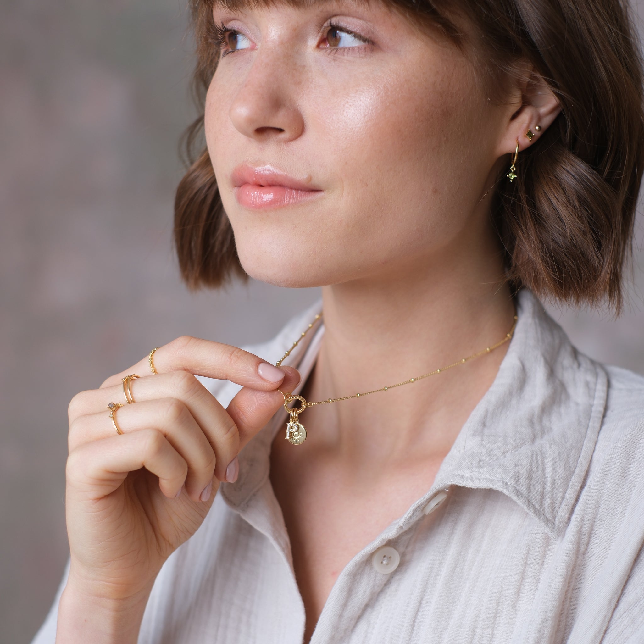 Sonnenmünzen-Anhänger